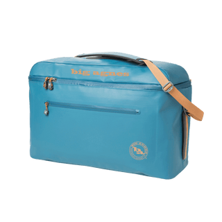 The Big Joe Gear Duffel by Big Agnes is a large blue heavy-duty bag featuring a zippered front pocket, yellow shoulder strap, top handle, and “Big Agnes” logo in yellow on the front.