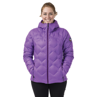 Person wearing a purple quilted jacket on a white background