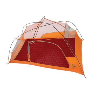 An orange and grey camping tent is set up on a white background with a Big Agnes Rapide SL Insulated Tent Floor Pad inside. The tent frame is assembled with a mesh top, but the rainfly is not attached.