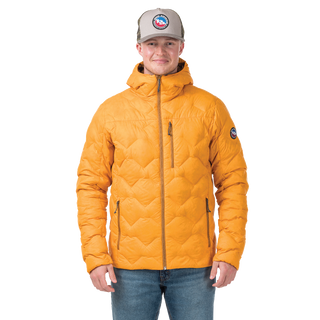 Person wearing a yellow quilted jacket with a brand logo on a white background